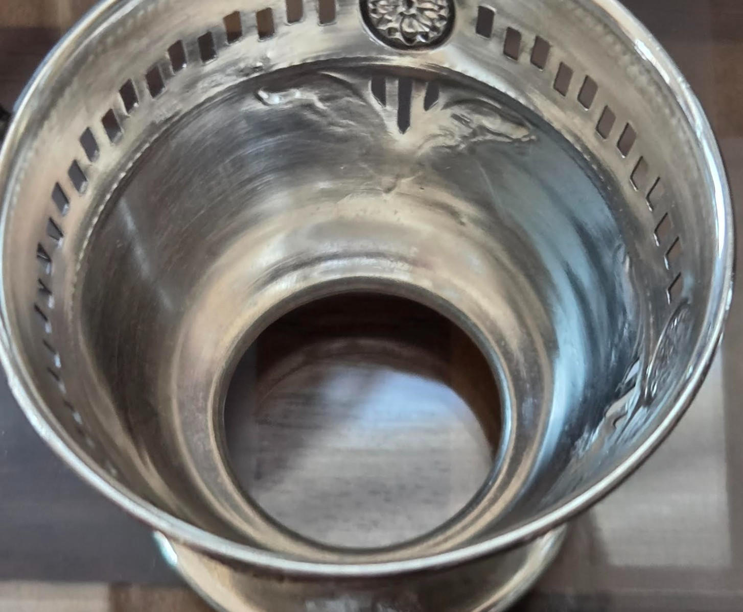 A Pair of Sterling Silver Teacups with 6 Porcelain Inserts