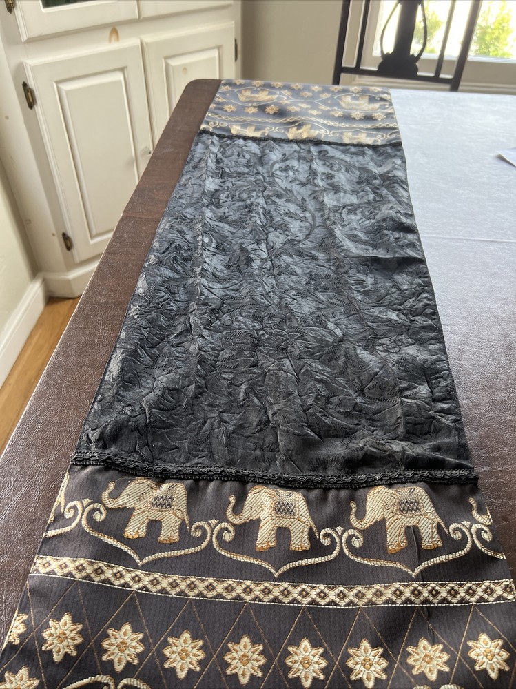 Table Runner With Gold Elephants On Black Backdrop