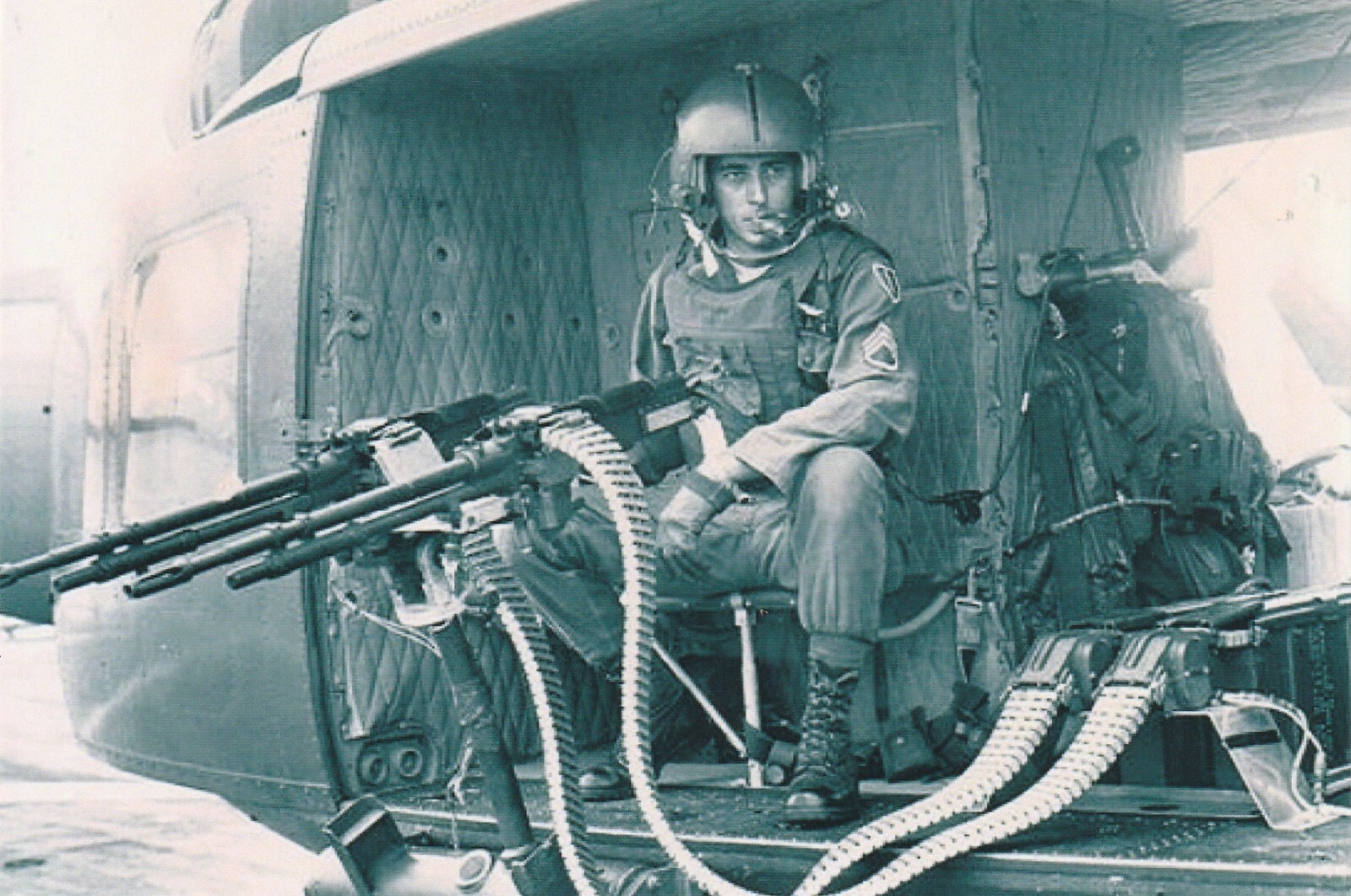 Vietnam  War  Photos --   UH-1 Huey + Door Gunner....
