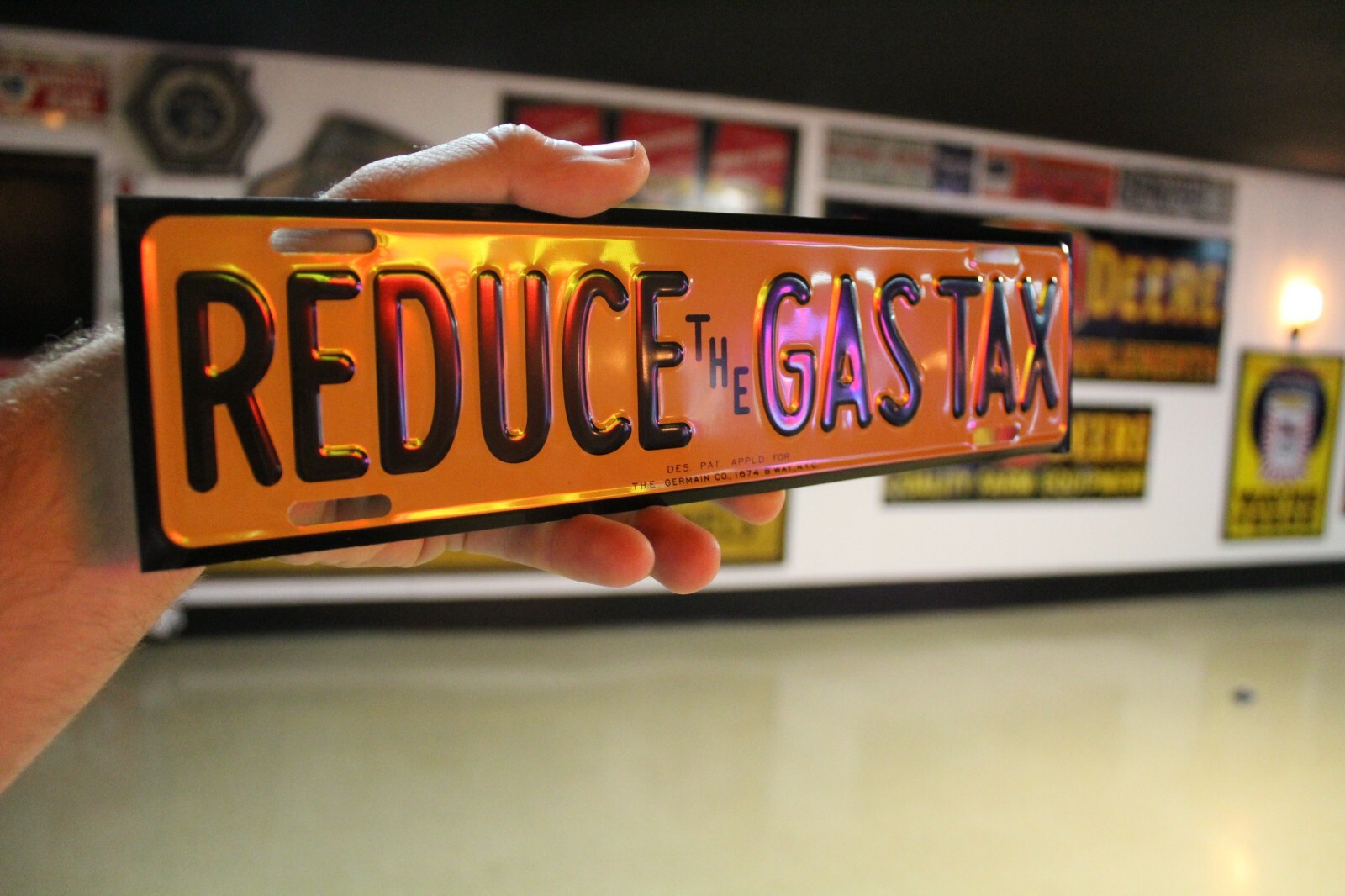 RARE REDUCE THE GAS TAX PLATE TOPPER EMBOSSED METAL SIGN SALES GAS OIL FORD