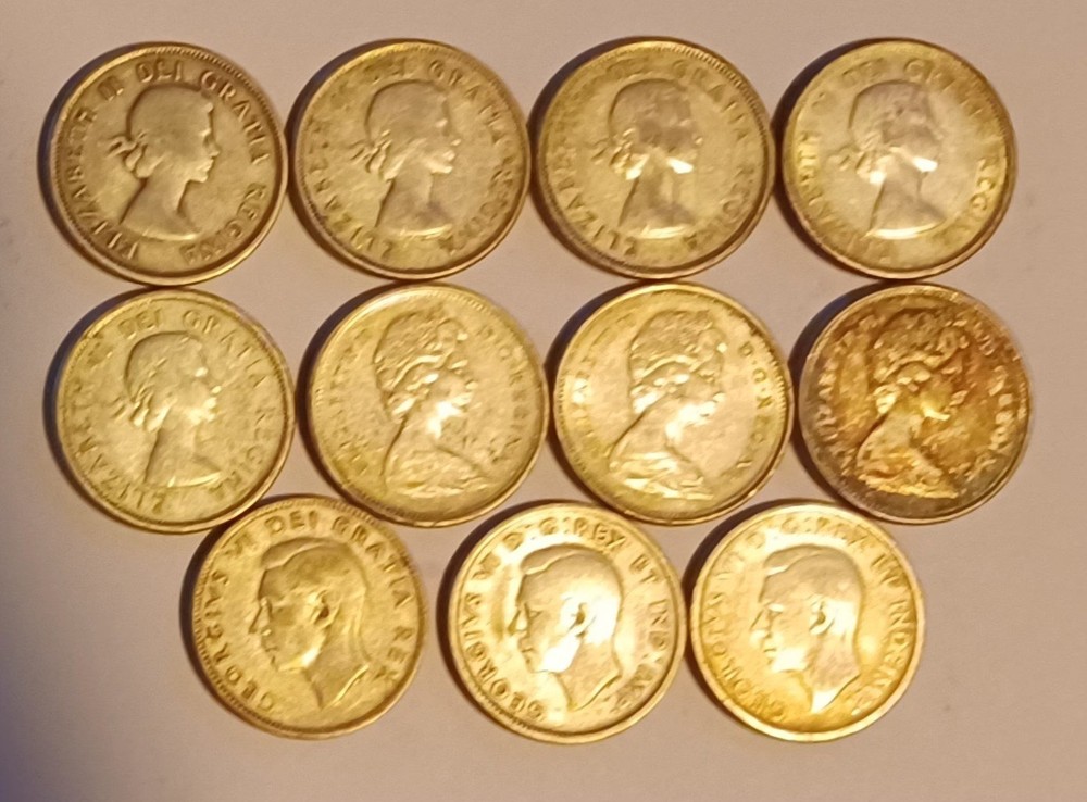 11 Canadian Quarters Silver