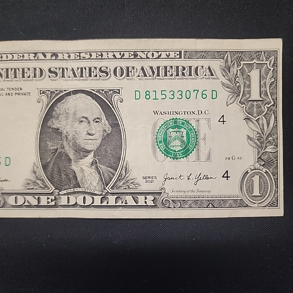 ERROR MISALIGNED MISCUT. ONE DOLLAR BILL
