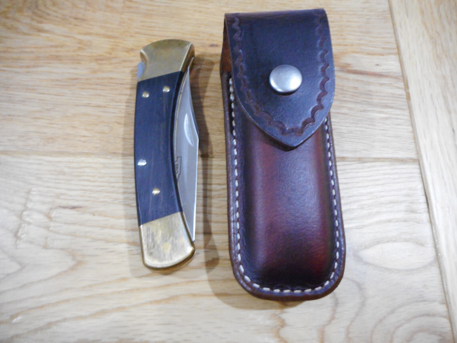 Buck 110 custom leather knife sheath. Brown. Tooled flap. Sheath only