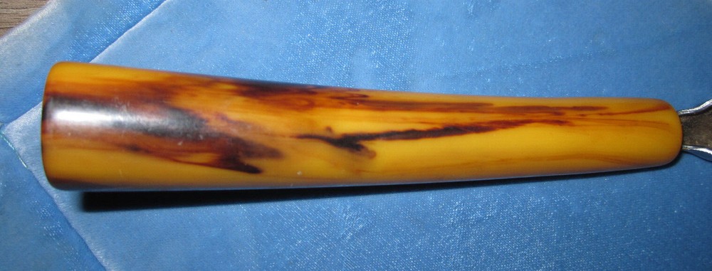 Vintage butterscotch Bakelite handle pull through knife sharpener