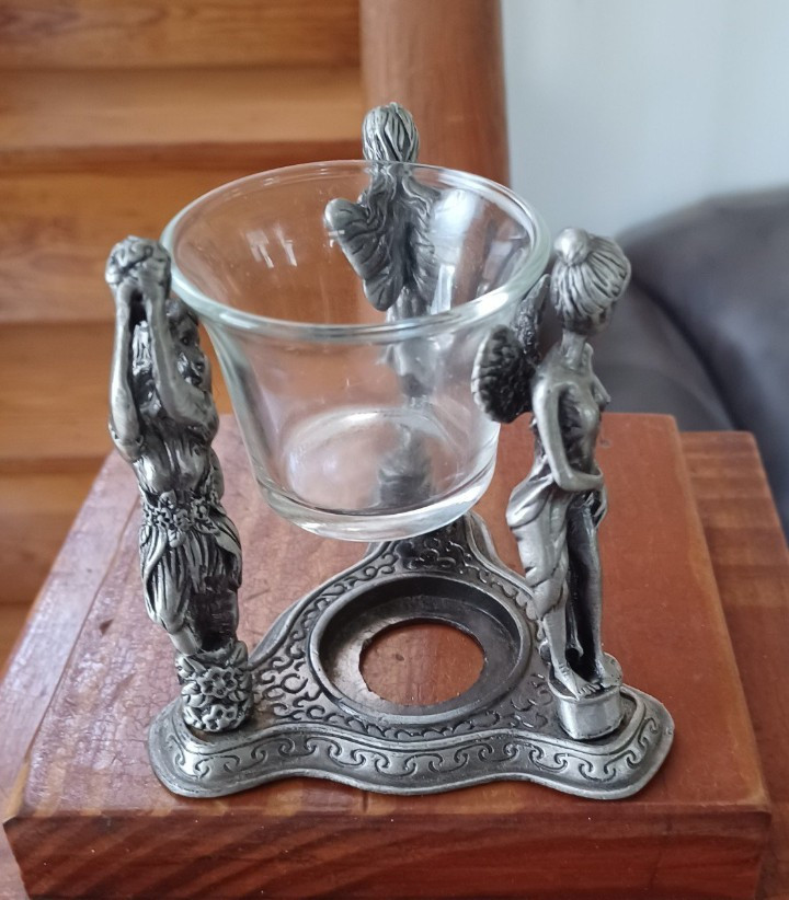 Metal 3 Character Pixie Tealight Holder.