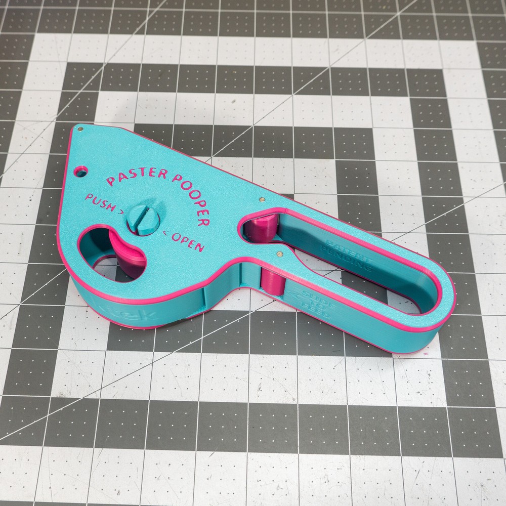 Paster Pooper - Paster Gun Sticker Applicator