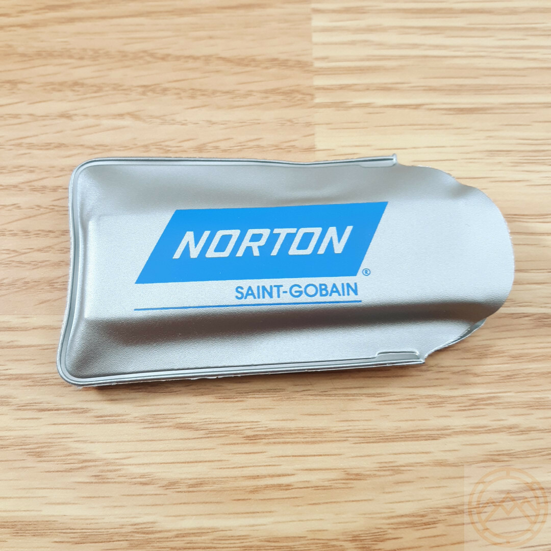 Norton Small Sportsman Fine Grit Pocket Stone Measures 3" x 7/8" x 3/8" Orange