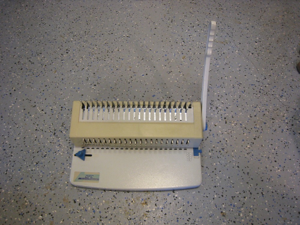 OFC Office binding comb machine  Used 8 Times.  Punches and Binds.