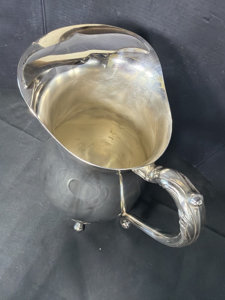 Sheridan Silverplate Pitcher Footed Ornate Handle