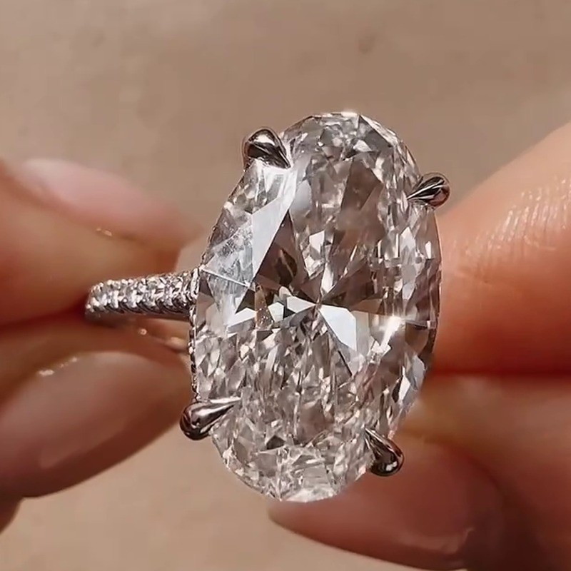 6.3 TCW Oval Cut Moissanite Hidden Halo Engagement Ring In 14k White Gold Plated