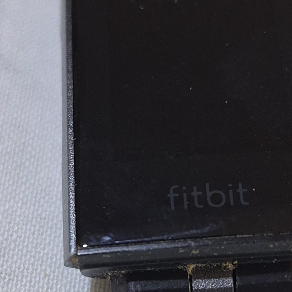 Fitbit Activity Tracker with Multiple Bands, Charging Cable, Protective Covers