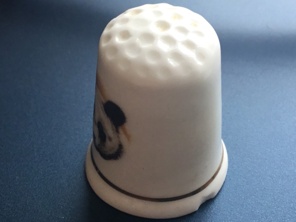 Panda thimble - Slightly chipped, hence the price Panda thimble - D