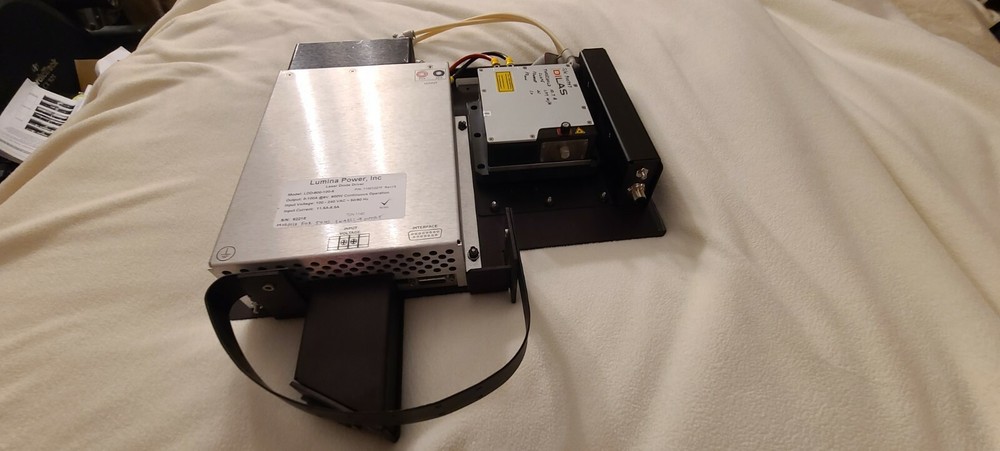 Coherent Laser Dilas with cooling block, interface unit and power supply.
