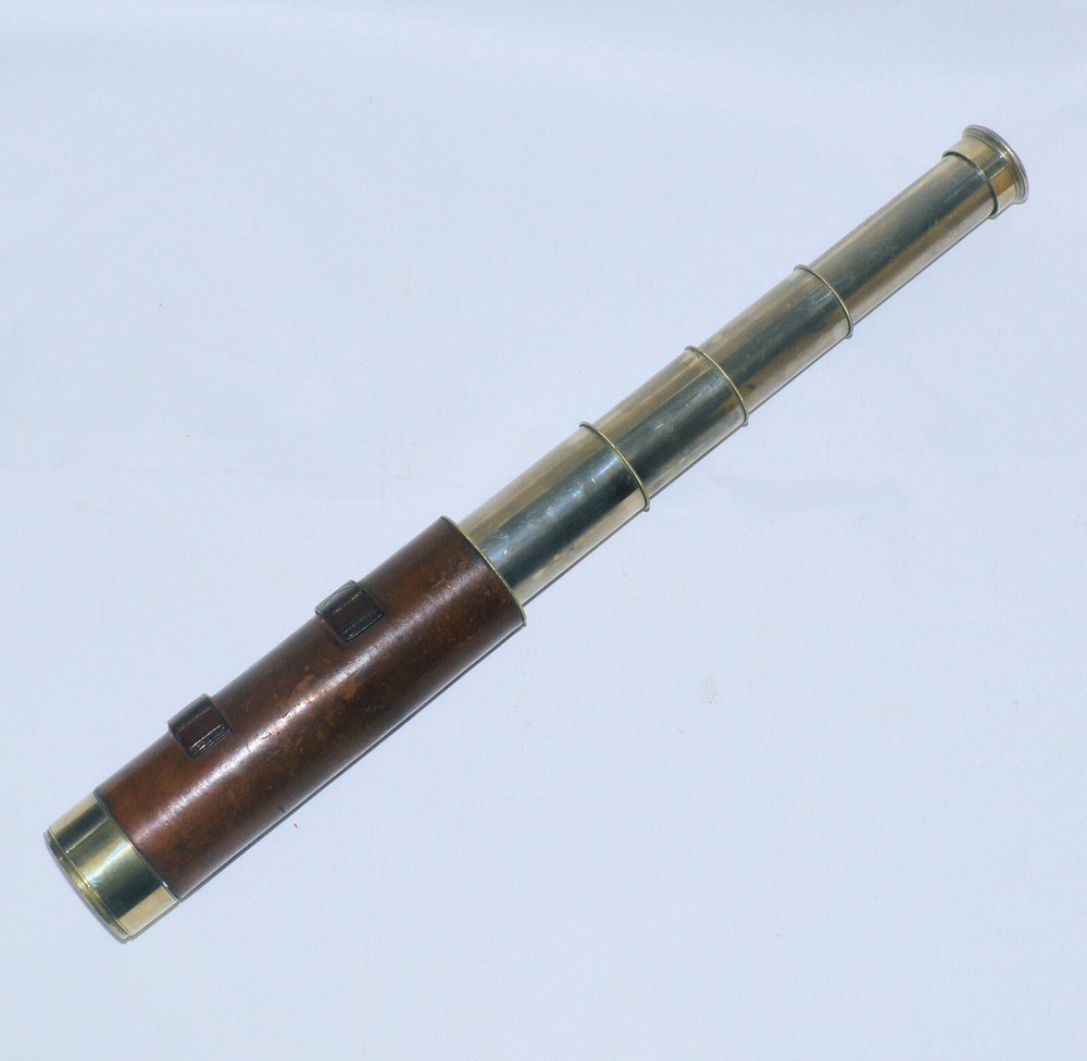 Telescope by E. & E. Emanuel with engraved nobility motif.