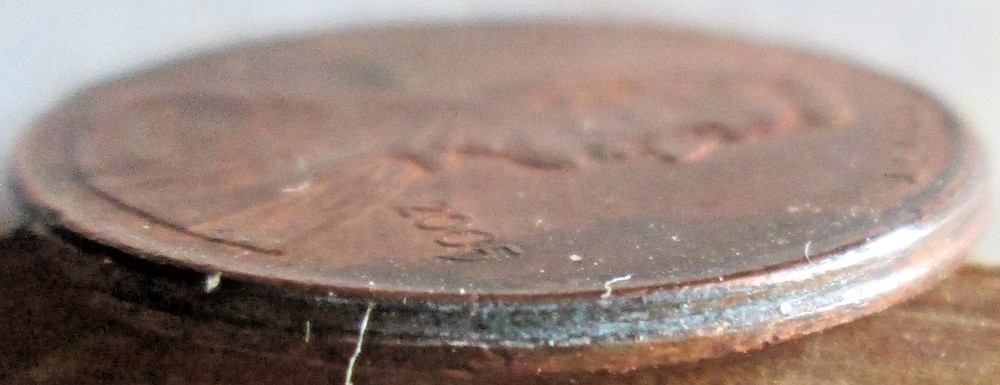 2005-P MEMORIAL CENT TILTED COLLAR STRIKE ERROR, MS-RED, CIRCULATED