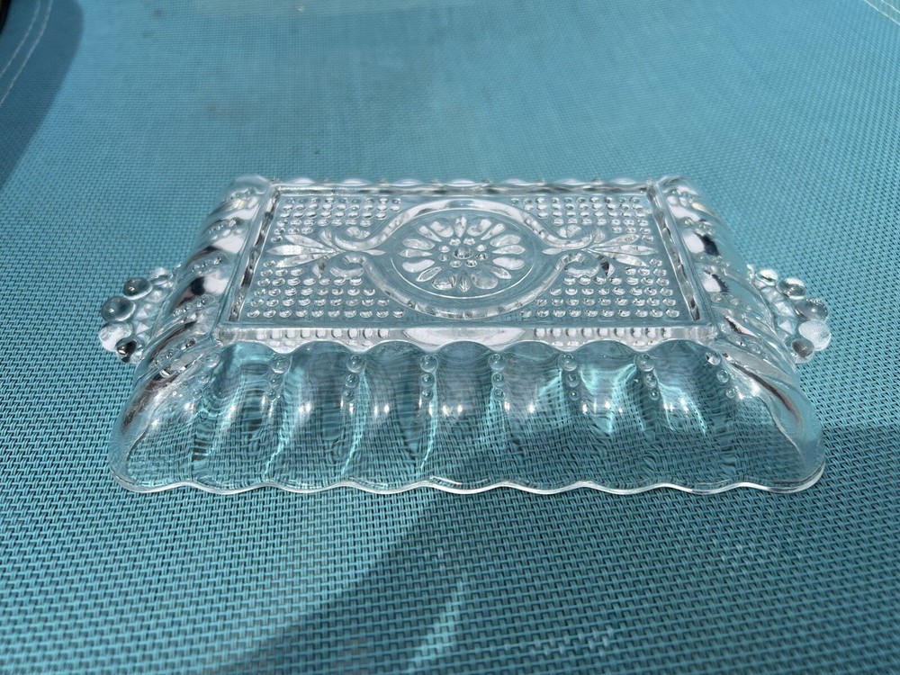small rectangle shape crystal server with handles.  In good condition.