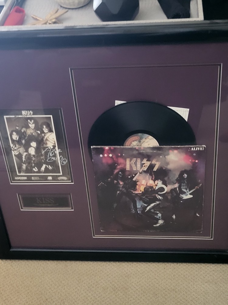 SIGNED KISS BAND MEMOROBILIA FRAMED FROM VEGAS