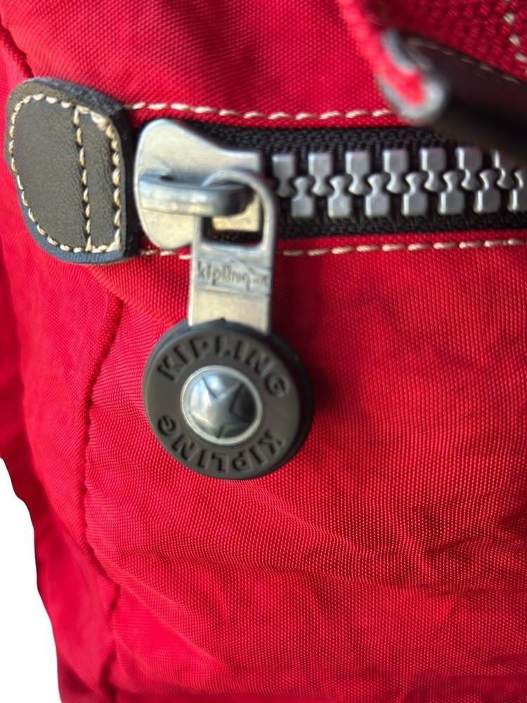 VTG 90’s Kipling Red Nylon Backpack Large Flap Buckle Drawstring Padded Back