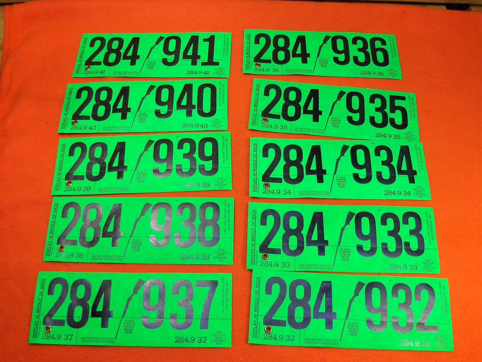 LOT OF 10 1990 CONSECUTIVE WISCONSIN DNR DEER LICENSE HUNTING GUN BACK TAGS