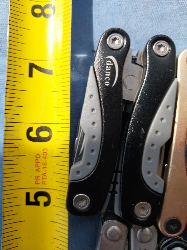 4 small multitudes with pliers knife scissors screwdriver's
