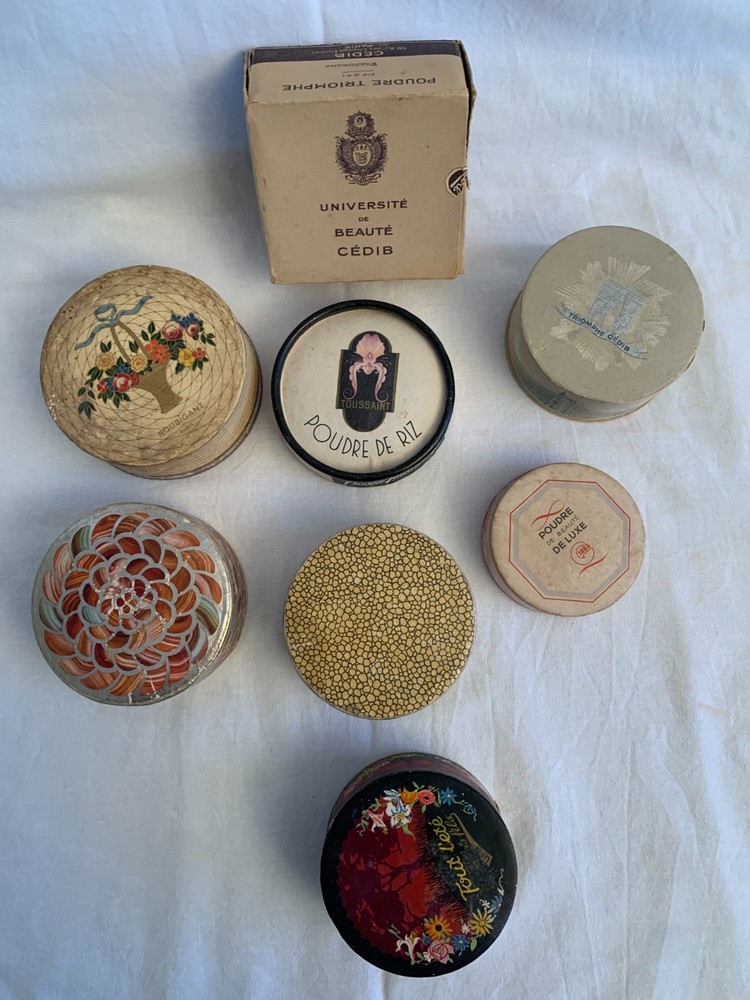 7 antique powder boxes, filled