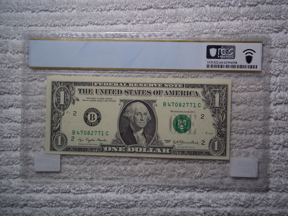 1977 $1 ERROR - Insufficient Inking PCGS 64 PPQ #E31 With BOOK ENDS LOOK