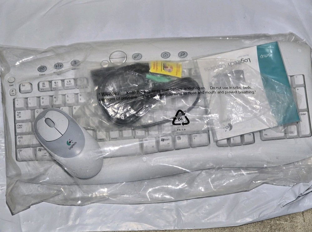 Logitech cordless Access Duo, keyboard and mouse.