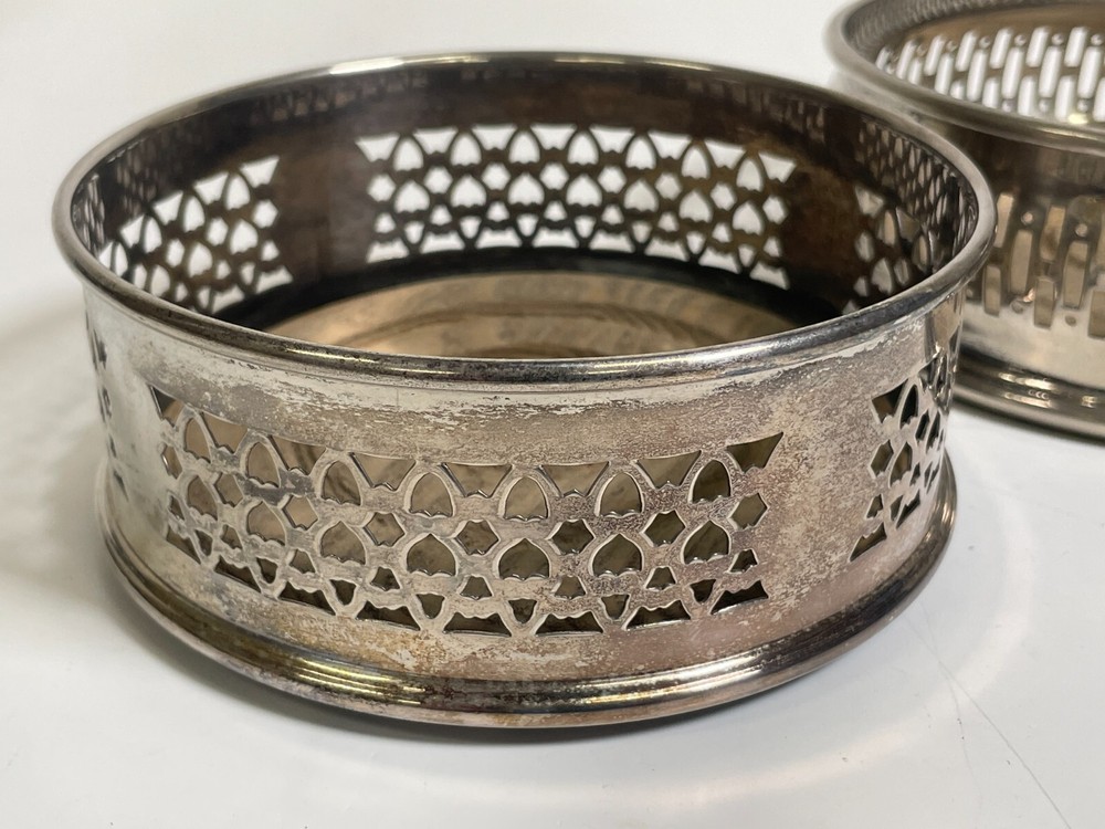 2 Silver Plated Bottle Caster Set Wood Base