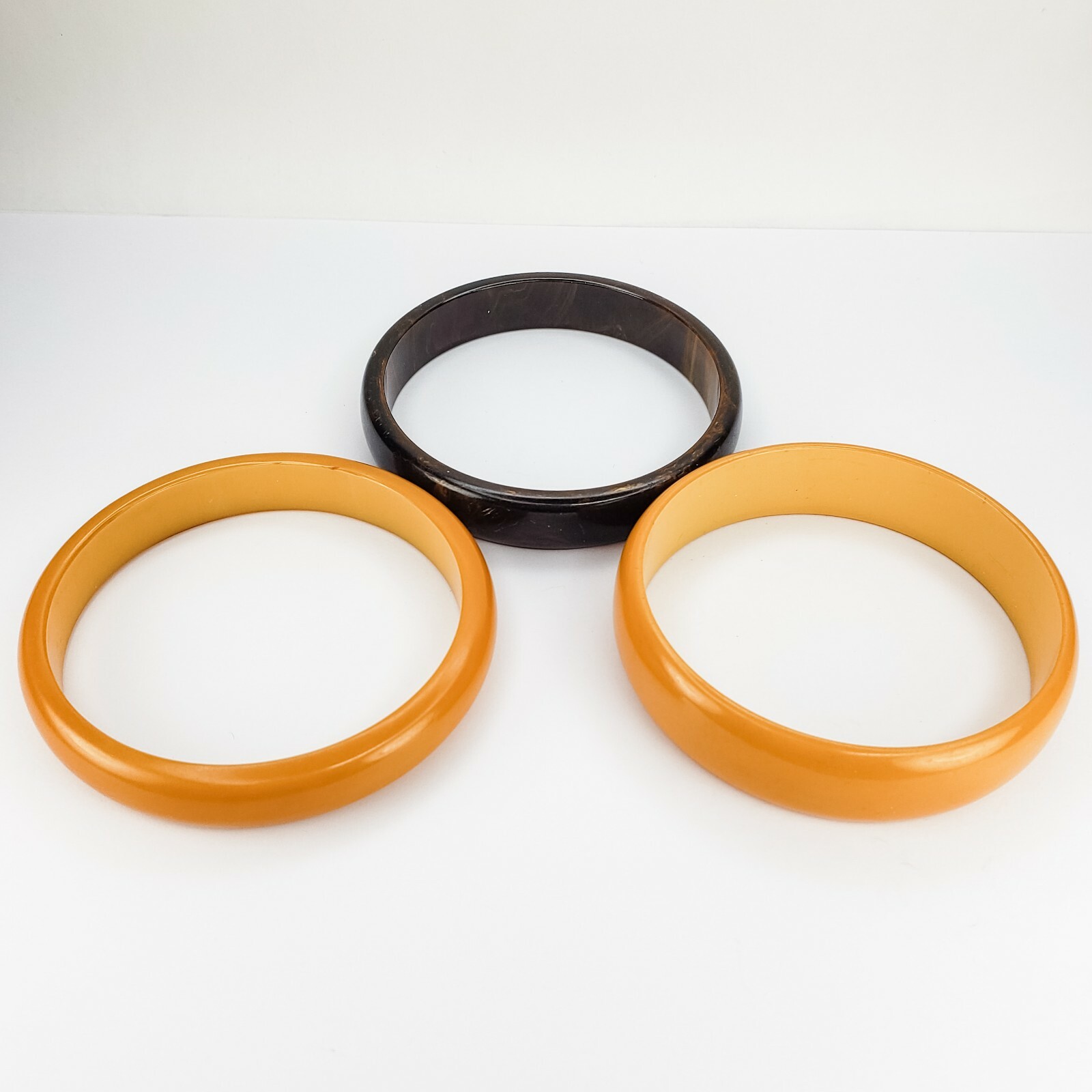 Set of 3 Two Butterscotch Yellow and One Brown Swirled Bakelite Bangle Bracelets