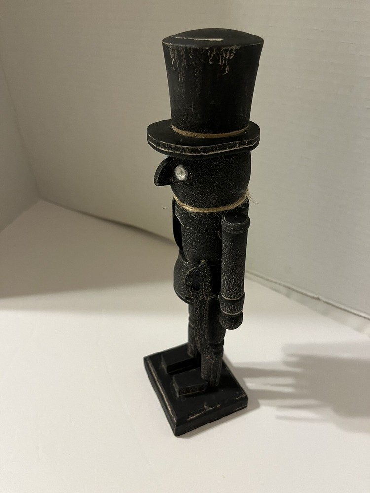 Black washed wooden folk art nutcracker