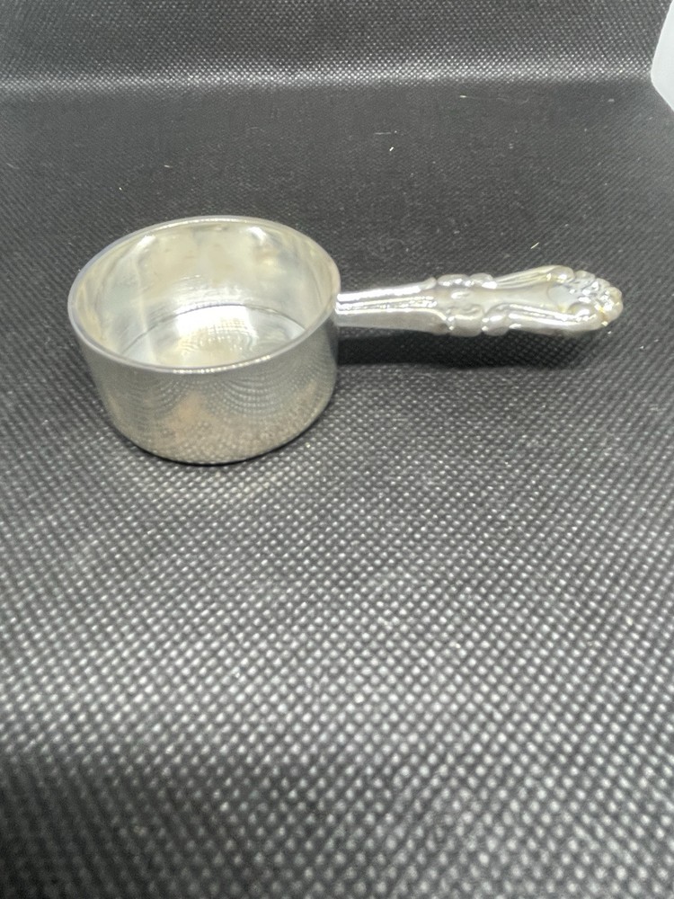SILVER PLATED COFFEE MEASURE.