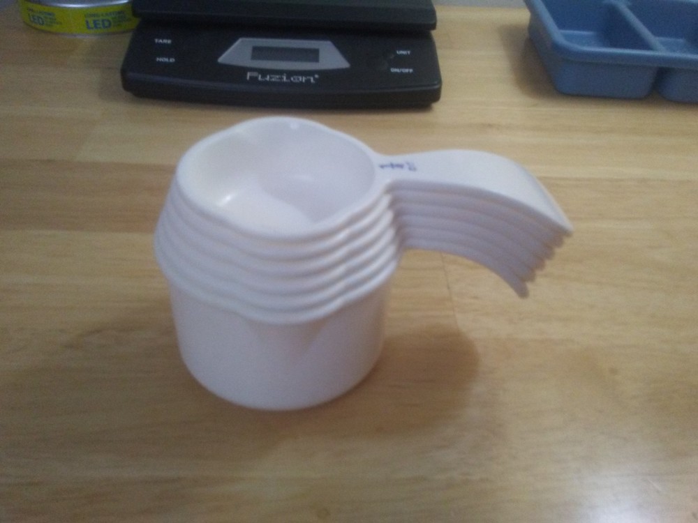 Tupperware curved handled measuring cups ergo