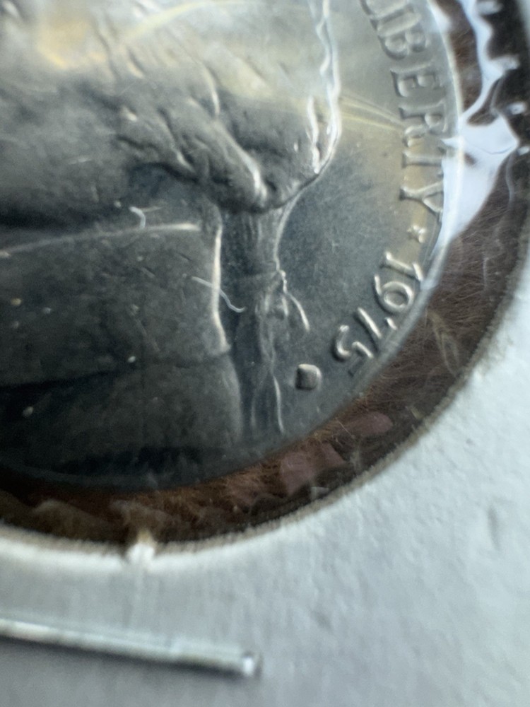 1975 D Nickel . Filled Mint Mark