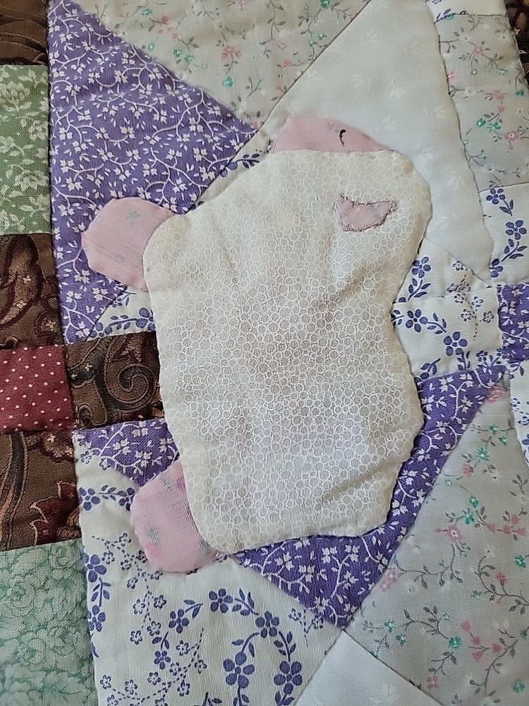 Handmade small quilt with a lamb appliqué pattern. 29"×29" Signed