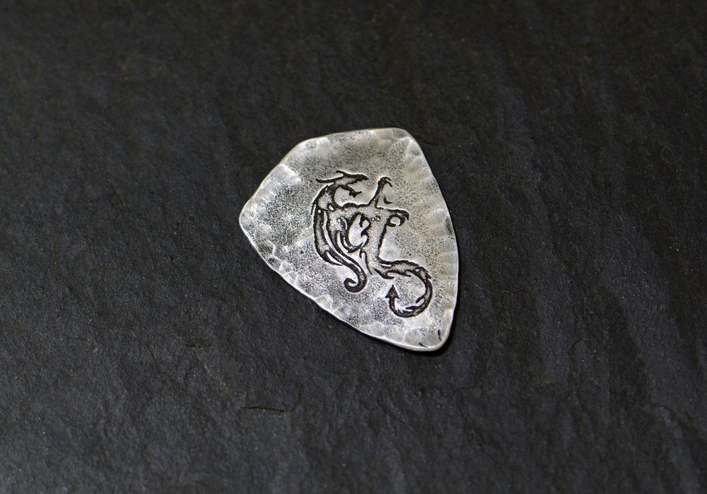 Sterling silver dragon guitar pick in shield shape