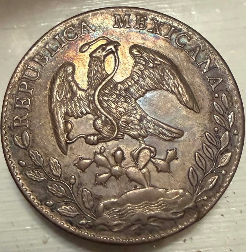 1896 8 Reals Cap & Rays coin