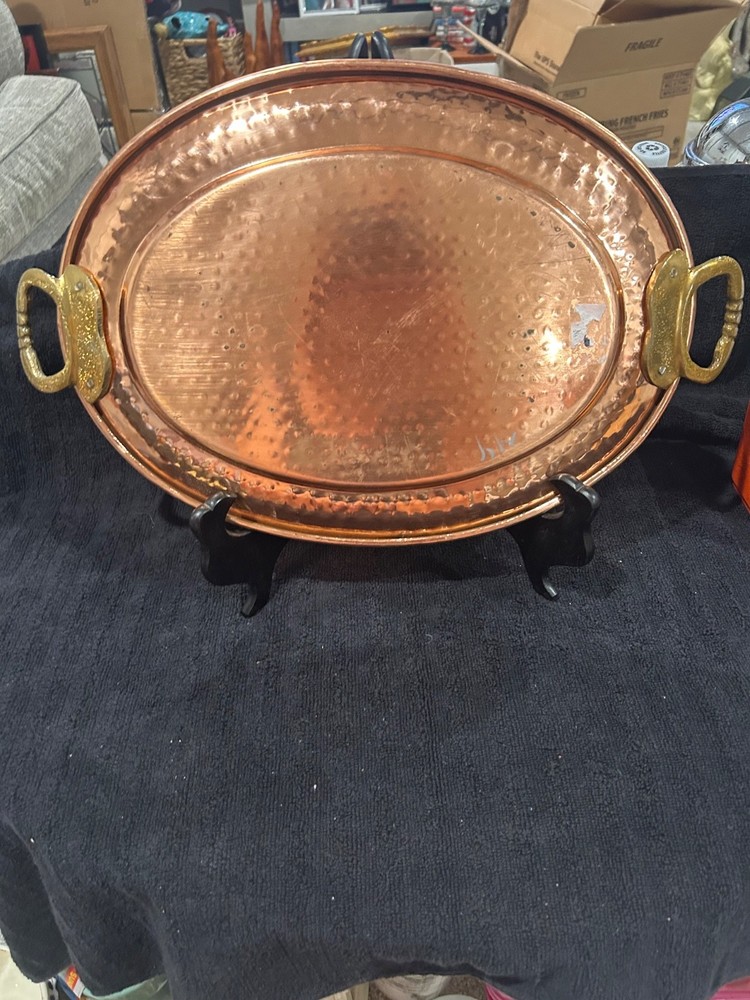 hammered copper oval serving tray with brass colored handles