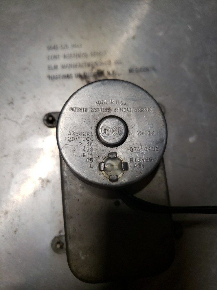 Vintage Elm Manufacturing Co Clock,