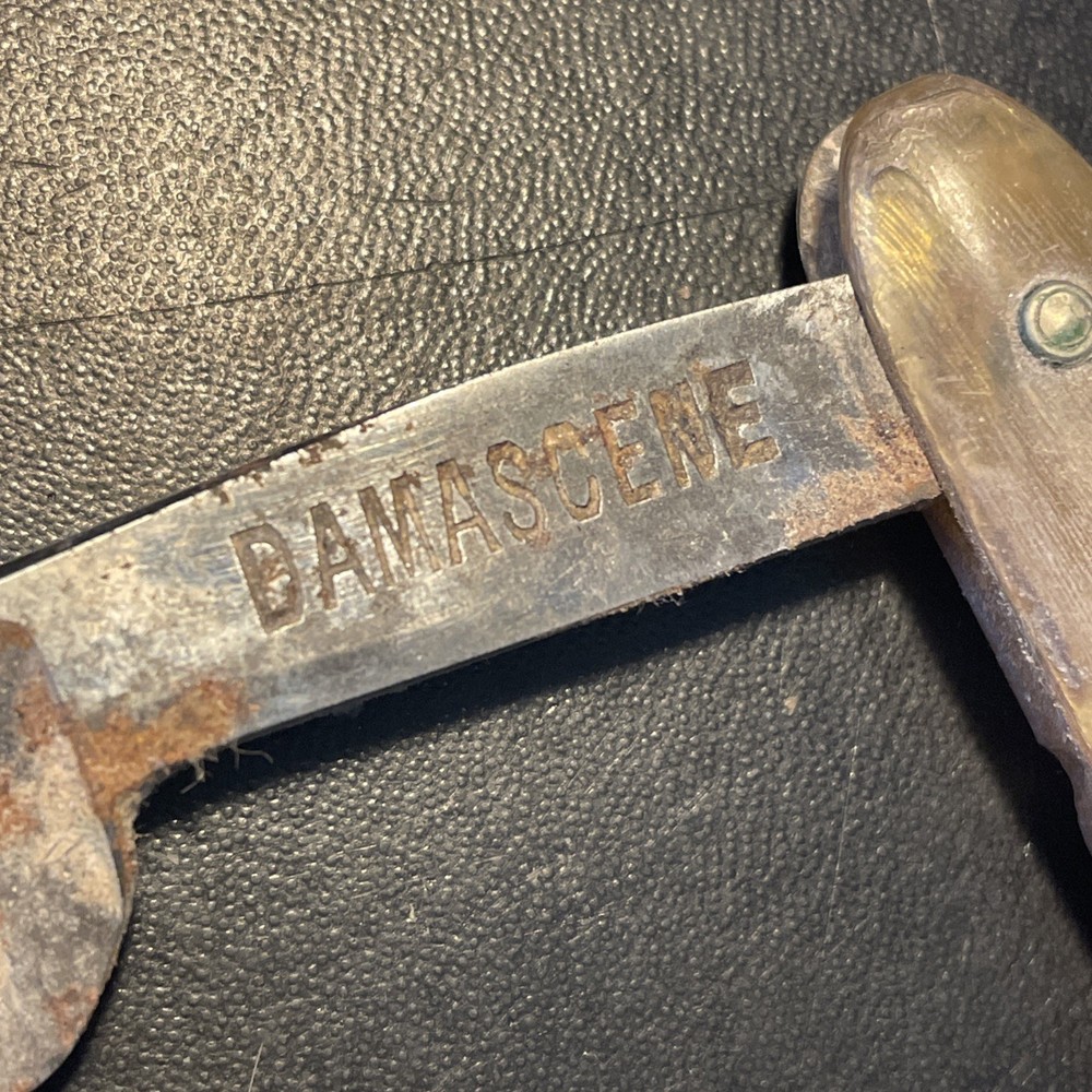 Two vintage straight razors