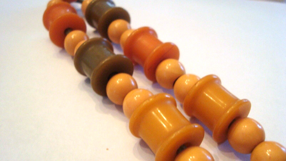 Vintage Bakelite Thread Spools and Bakelite Beads