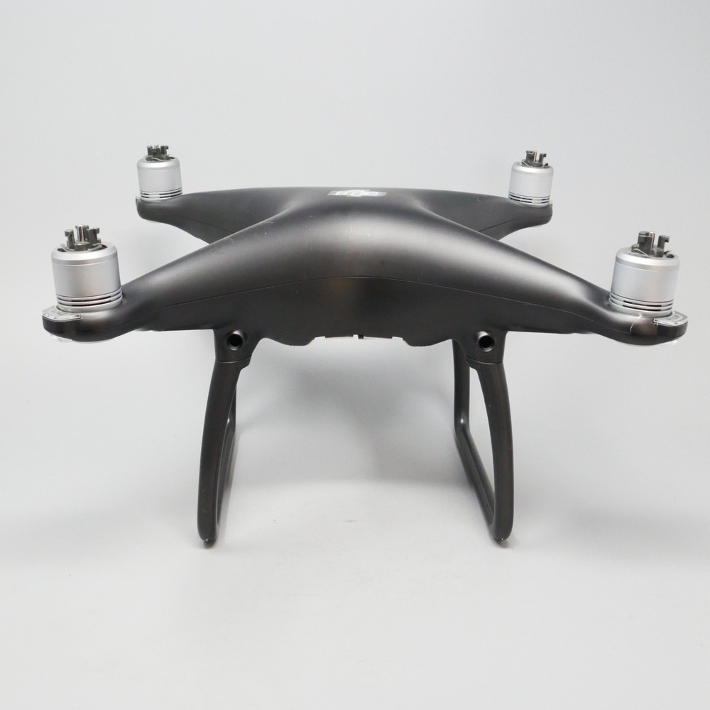 DJI Phantom 4 Quadcopter Drone Only no controller camera battery --- plus Props