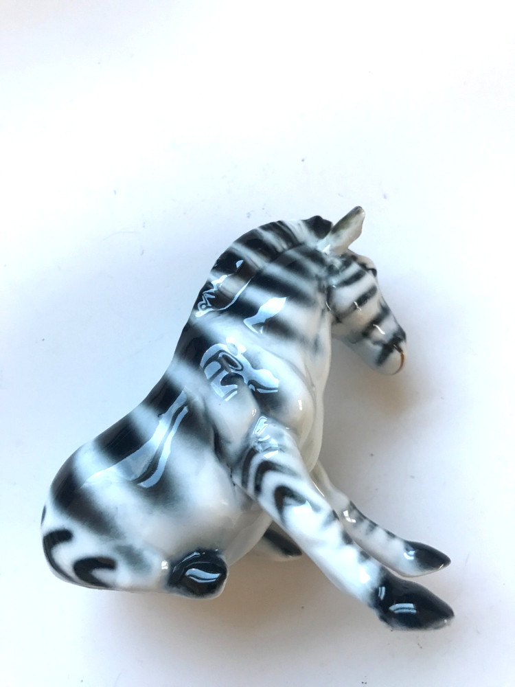 UNUSUAL BONE CHINA SITTING ZEBRA FIGURINE
