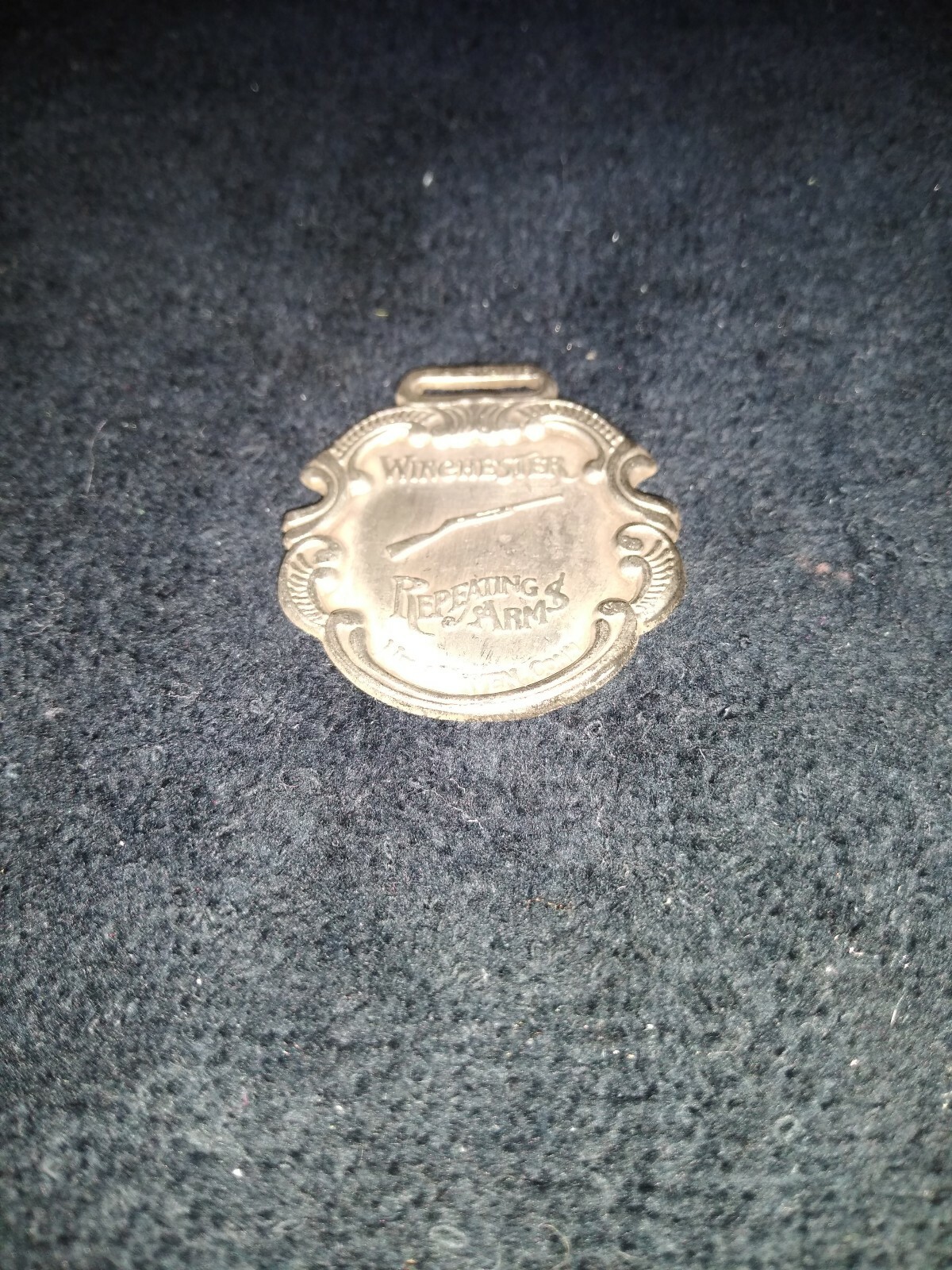 Winchester Repeating Arms Wàtch Fob 2 1/2 x 1 1/2 polished SS Very Nice