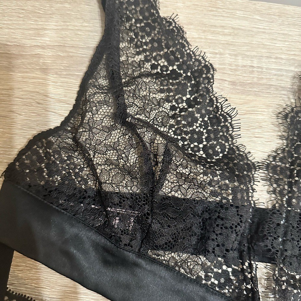 Victorias Secret Black Lace Thong Bodysuit. Size large.