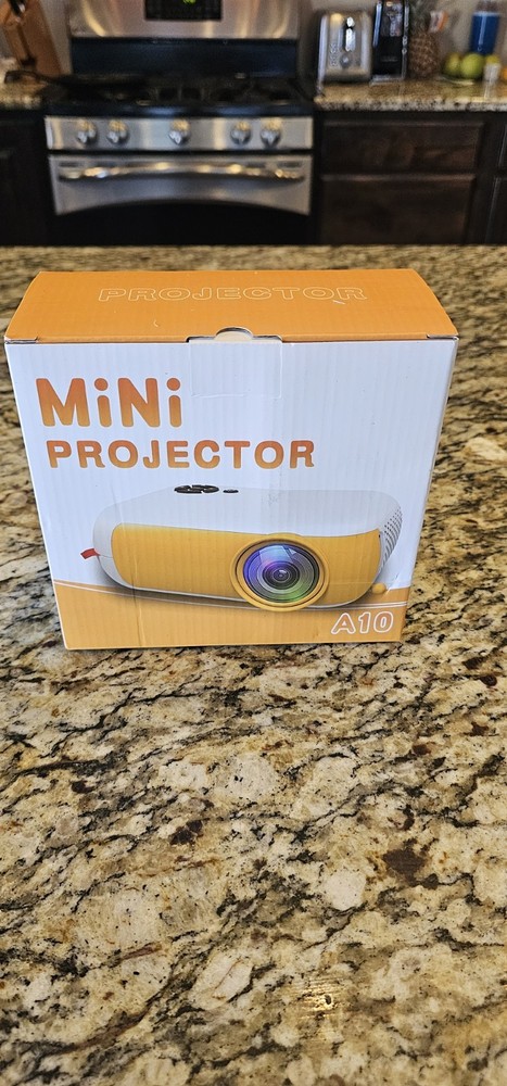 DBLION A10 Mini Projector Yellow Desktop, Multifunctional Interface, Own Audio