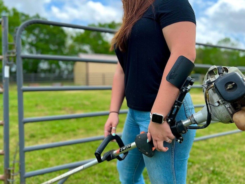 The Midigator Ergonomic Trimmer Arm Support