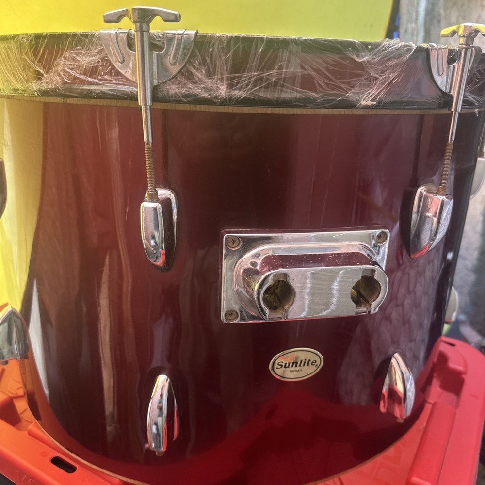 Sunlite drum, likely a floor tom or a bass drum, based