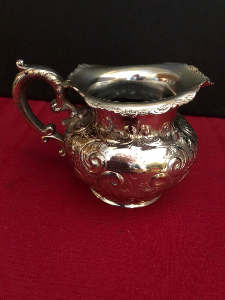 Barbour Silver Company. Quadruple Creamer