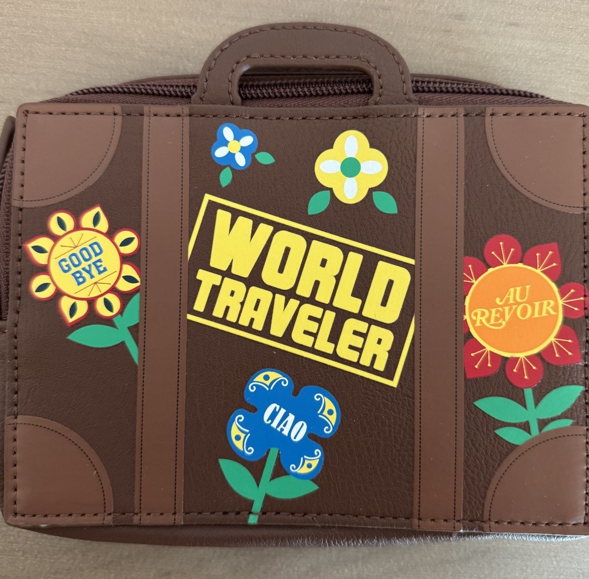 Disney Parks “ It’s A Small World” Traveler Clutch