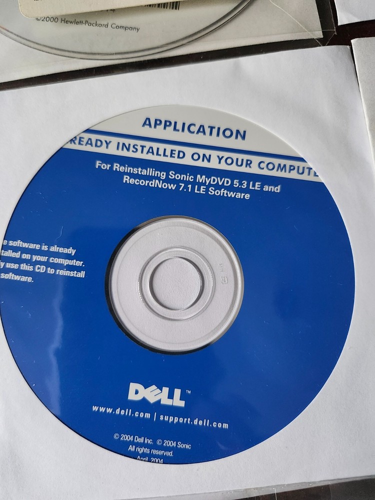 assorted computer installation and program discs
